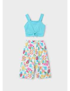 Conjunto pantalón largo estampado y top niña